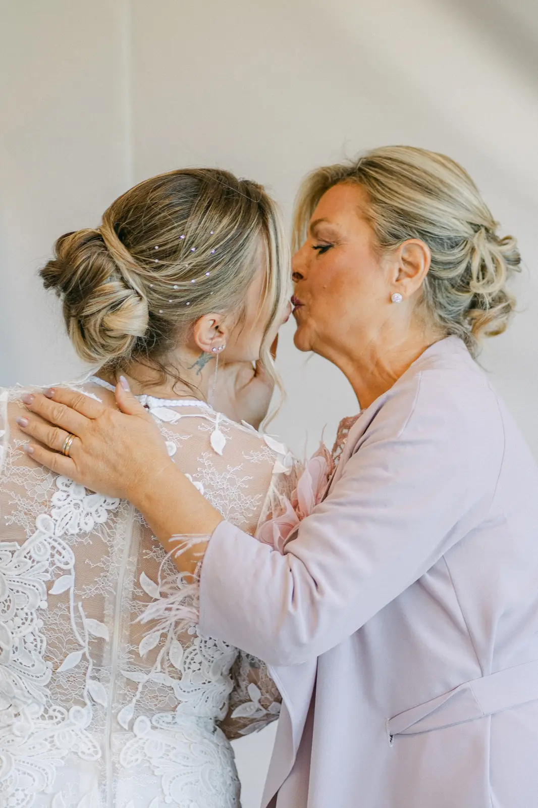An embrace with the bride during the getting ready