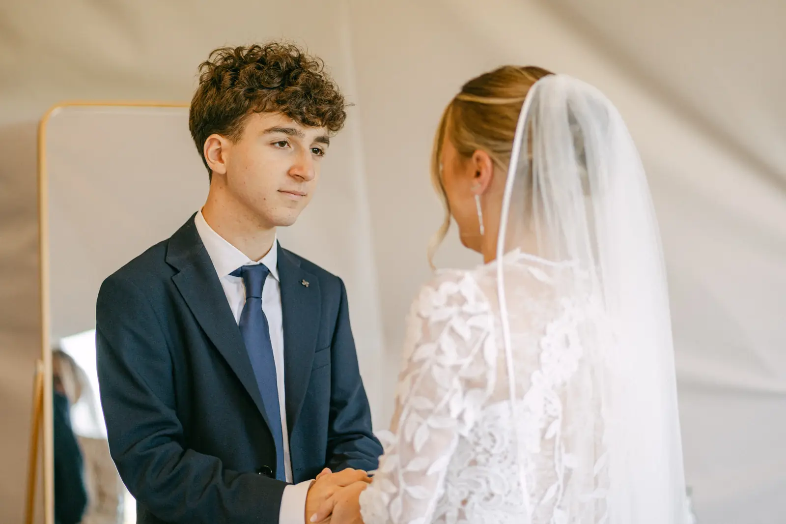 The bride with a family member before heading to the ceremony