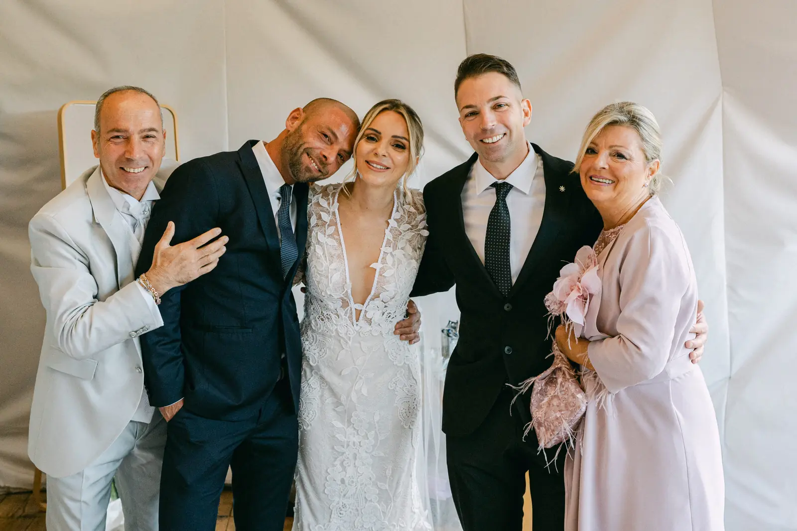 The bride with a group of guests before the ceremony
