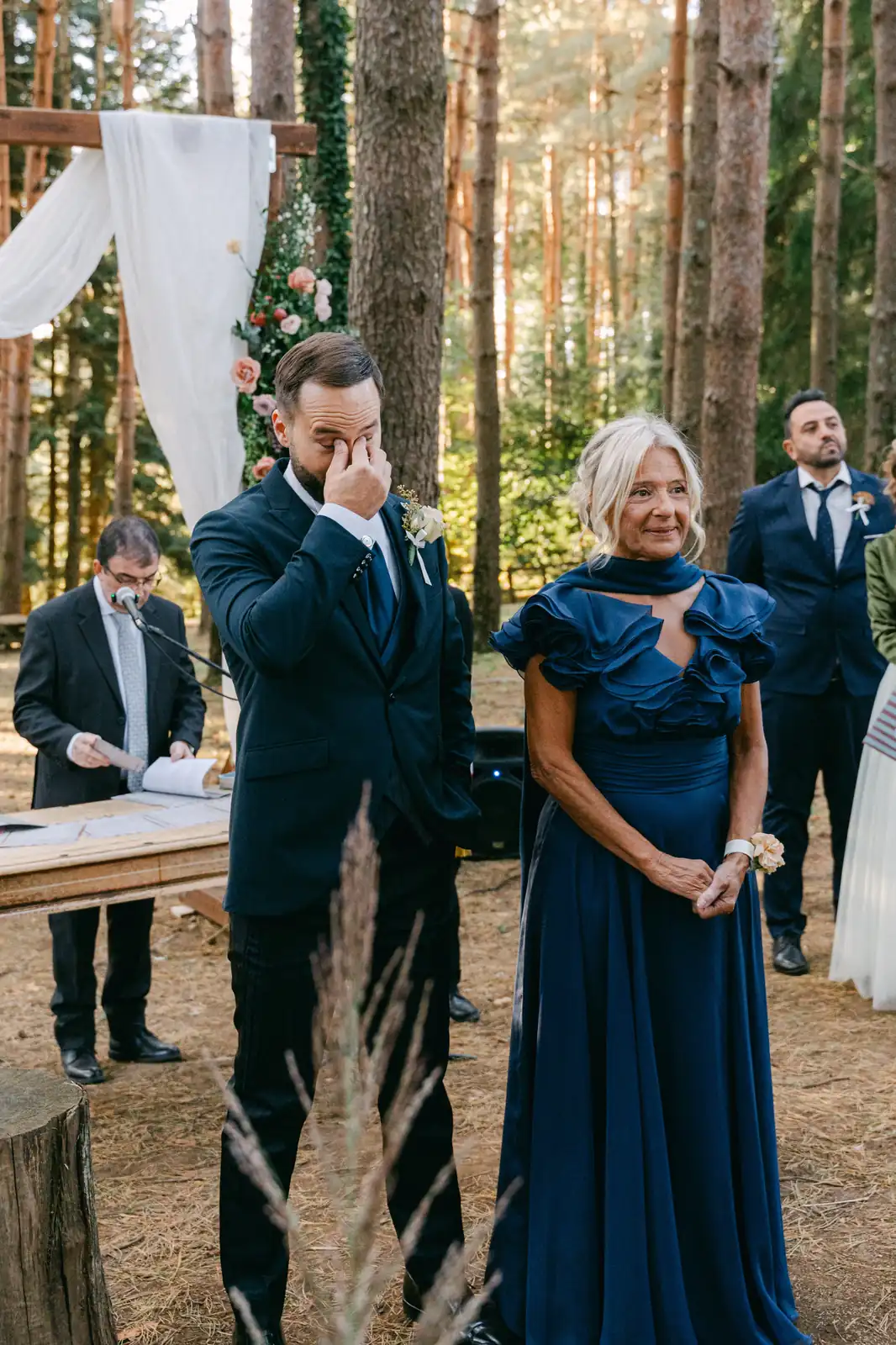 The emotional groom waiting for the bride at the ceremony
