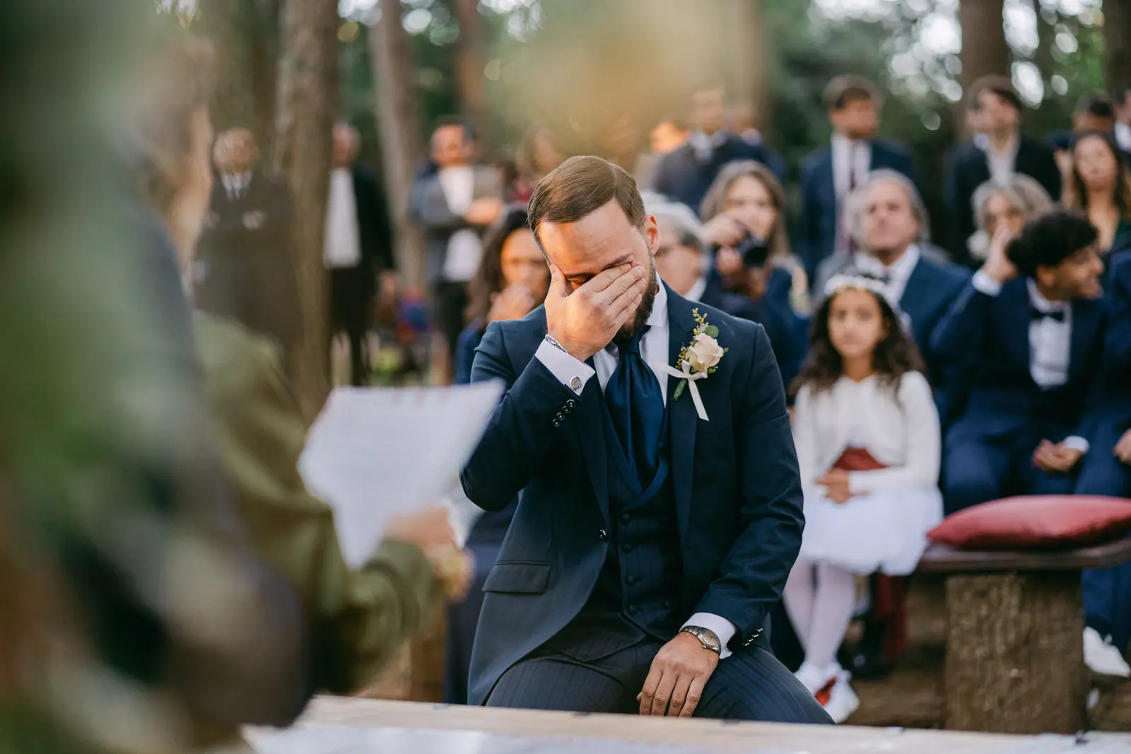 The groom in tears during the bride’s entrance
