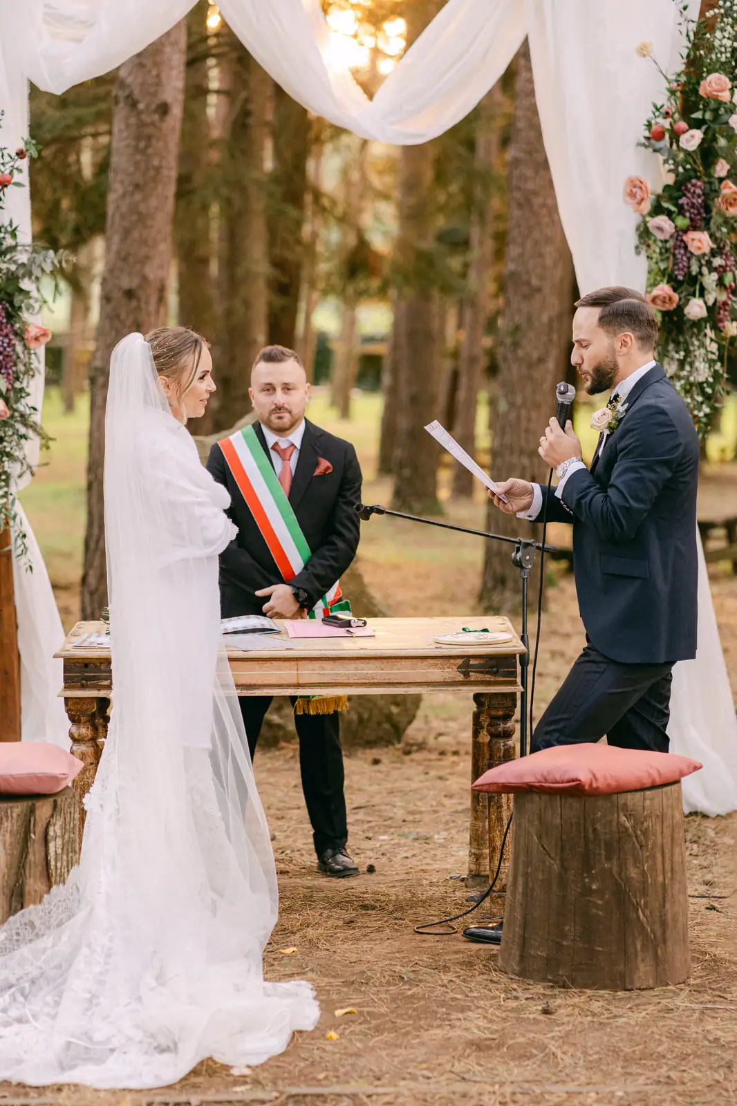 Signing the register during the civil ceremony in the woods
