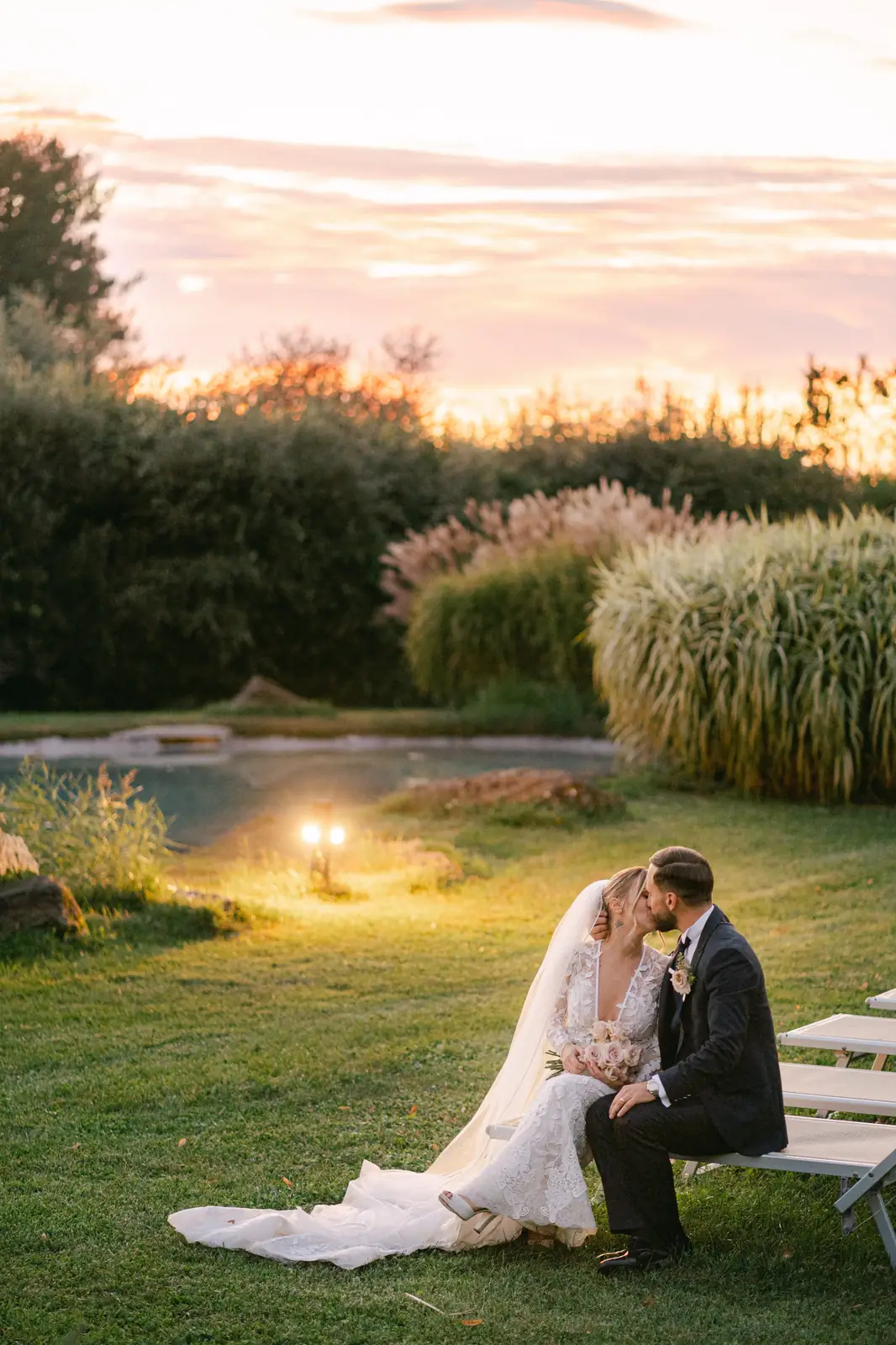 The couple by the little lake at Parco dei Cimini at sunset