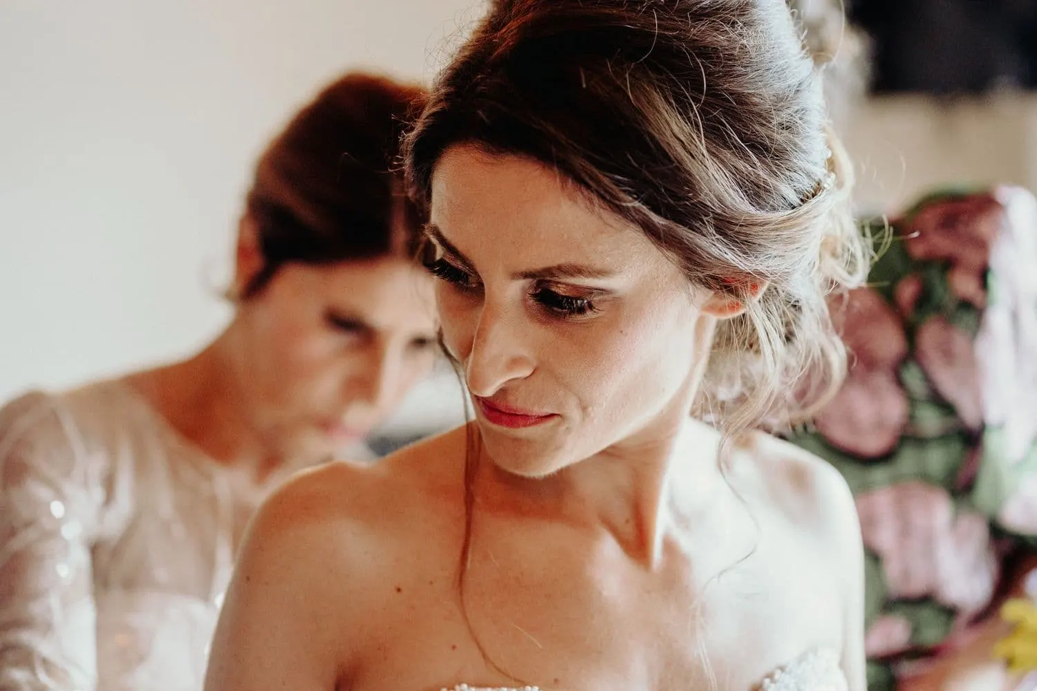 Giulia in her wedding dress during the final touches